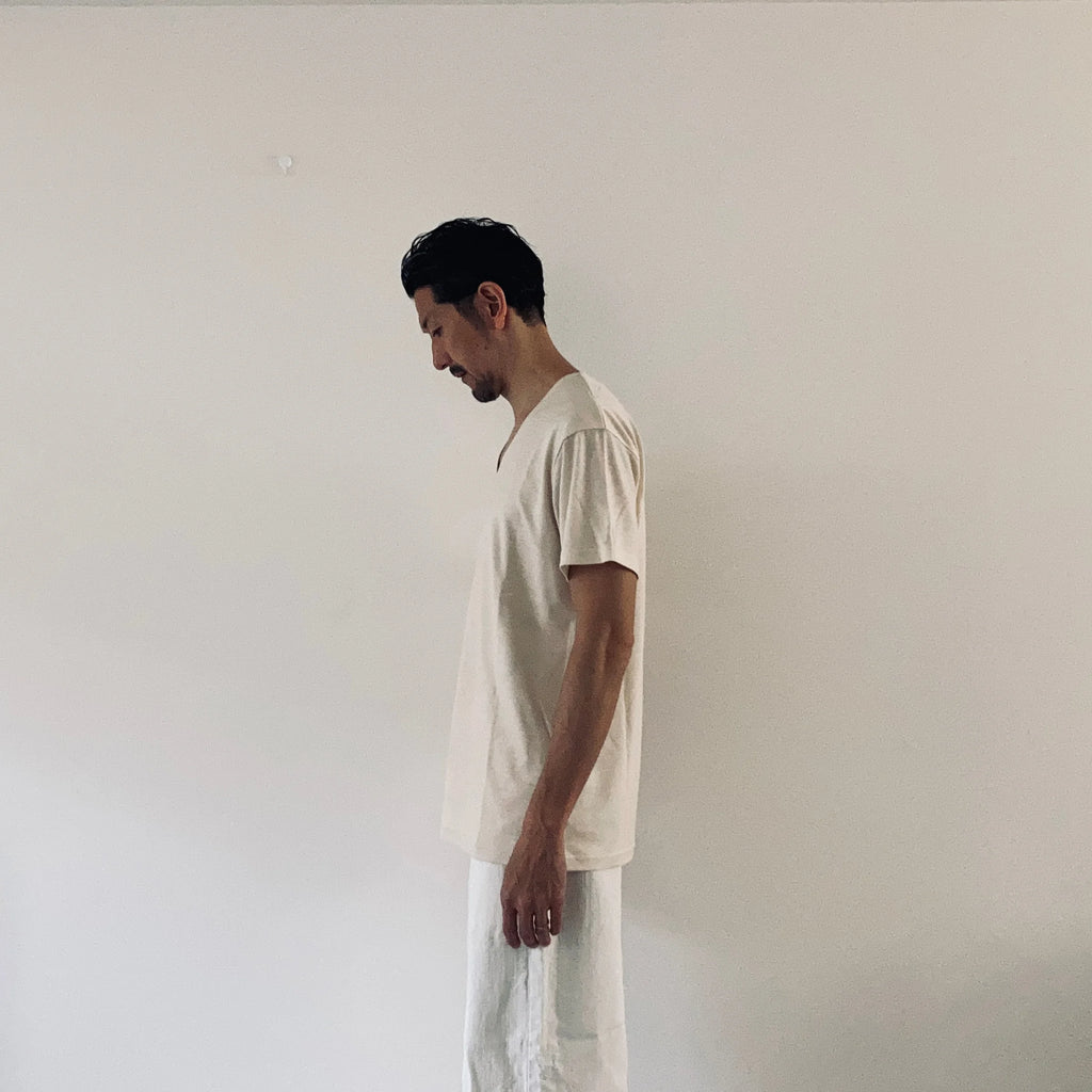 cleaveland    <br>  ”Out of everywhere”   <br> V/pullover Short sleeve  wool jersey Light beige