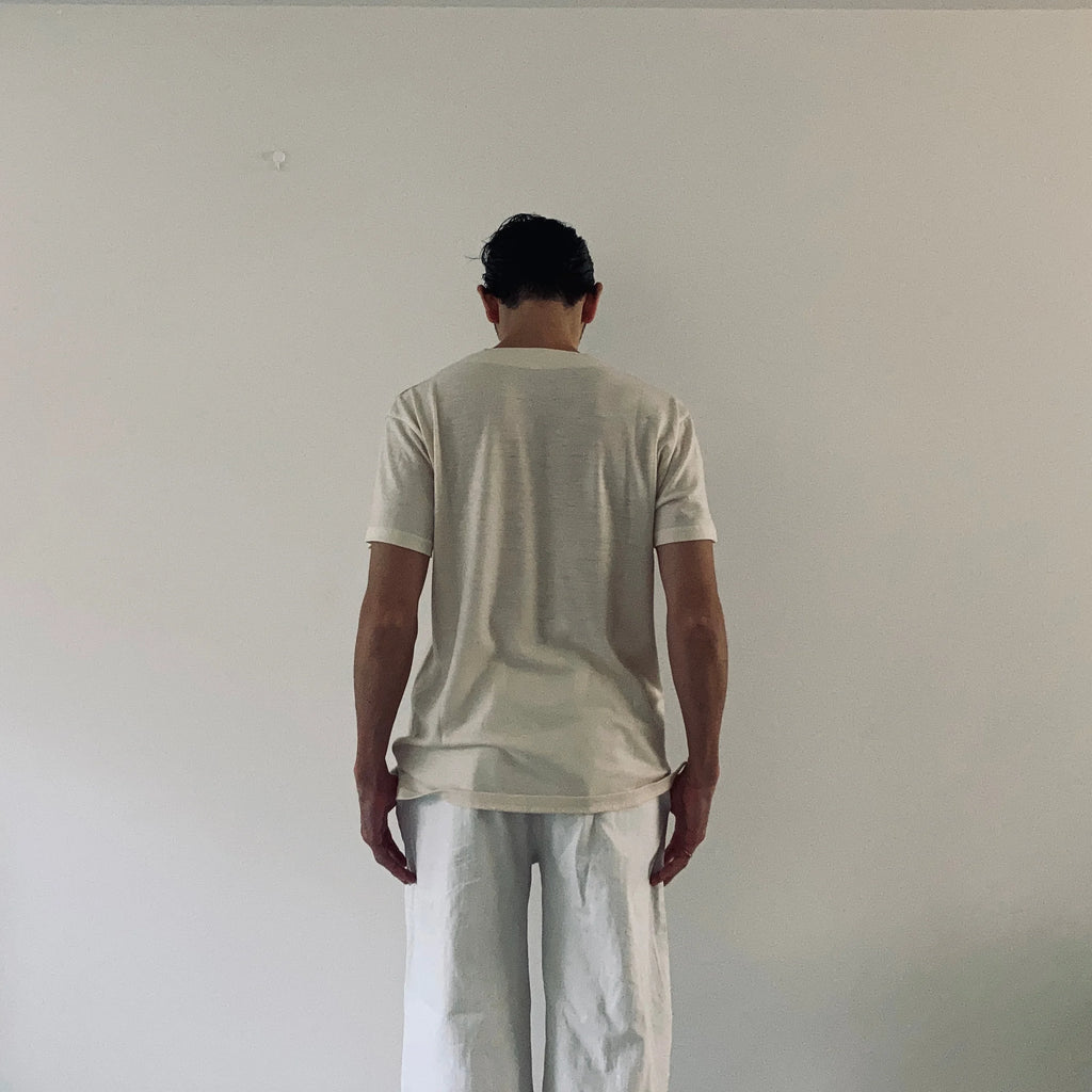 cleaveland    <br>  ”Out of everywhere”   <br> V/pullover Short sleeve  wool jersey Light beige