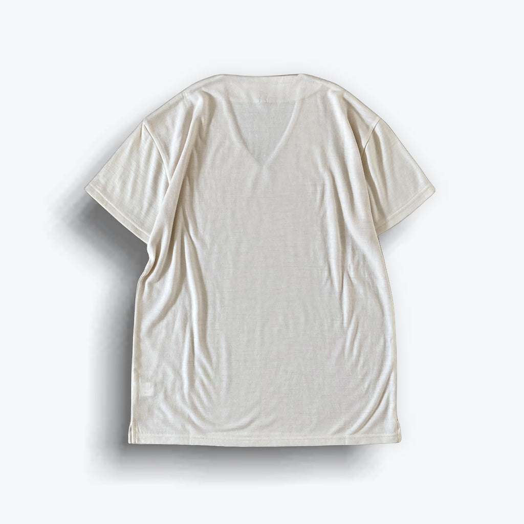 cleaveland    <br>  ”Out of everywhere”   <br> V/pullover Short sleeve  wool jersey Light beige