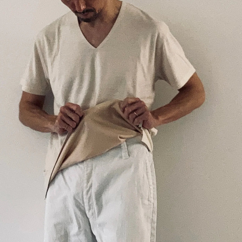 cleaveland    <br>  ”Out of everywhere”   <br> V/pullover Short sleeve  wool jersey Light beige