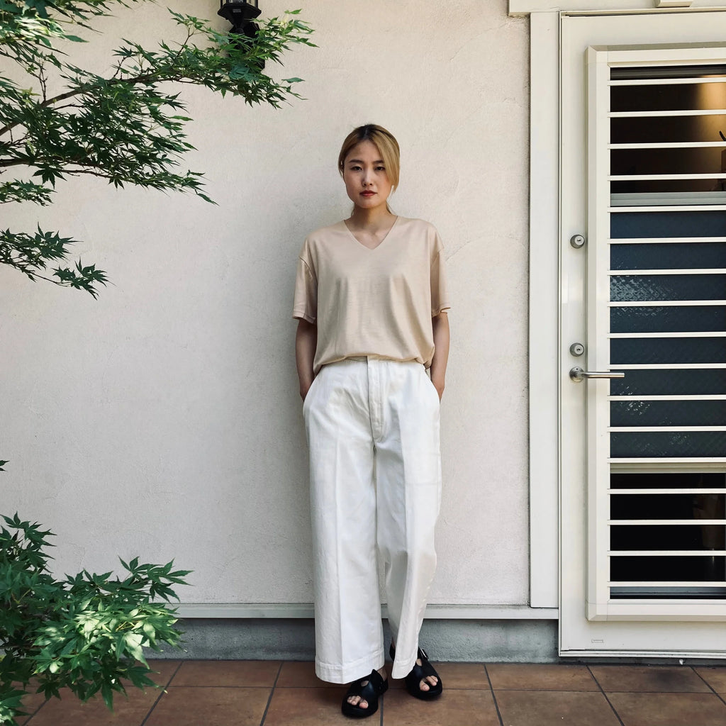 cleaveland    <br>  ”Out of everywhere”   <br> V/pullover Short sleeve  wool jersey Light beige