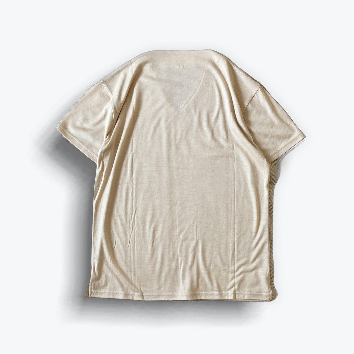 cleaveland   <br>   ”Out of everywhere”   <br> V/pullover Short sleeve  wool jersey Mocha beige