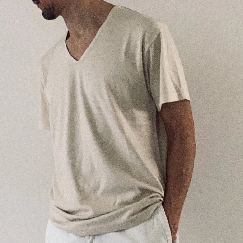 cleaveland    <br>  ”Out of everywhere”   <br> V/pullover Short sleeve  wool jersey Light beige