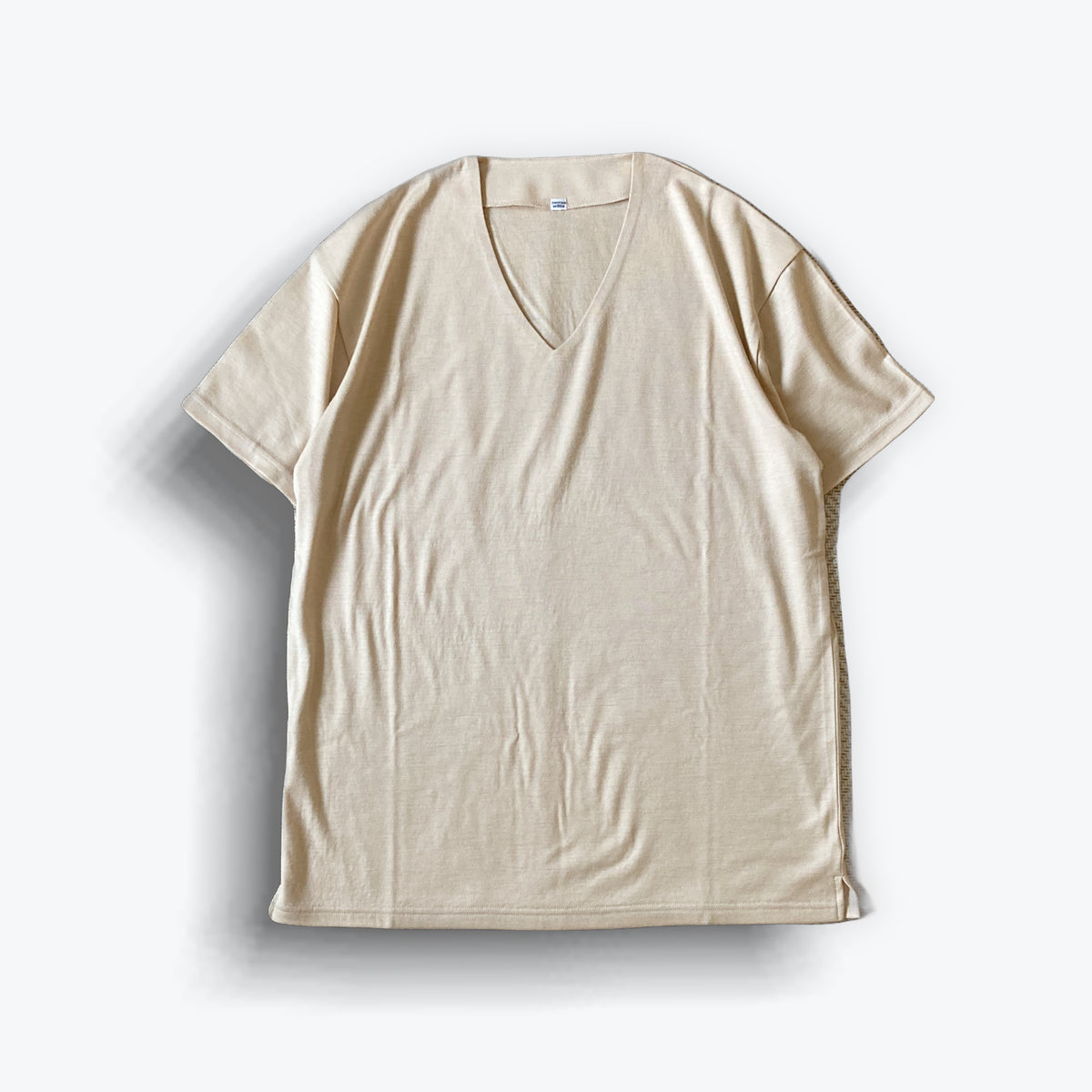 cleaveland   <br>   ”Out of everywhere”   <br> V/pullover Short sleeve  wool jersey Mocha beige